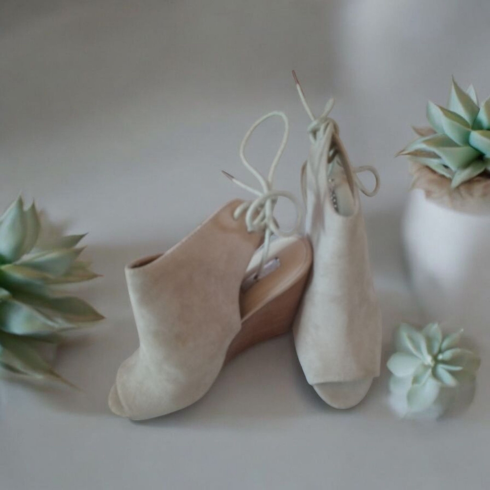 Elegant Cream Wedge Booties